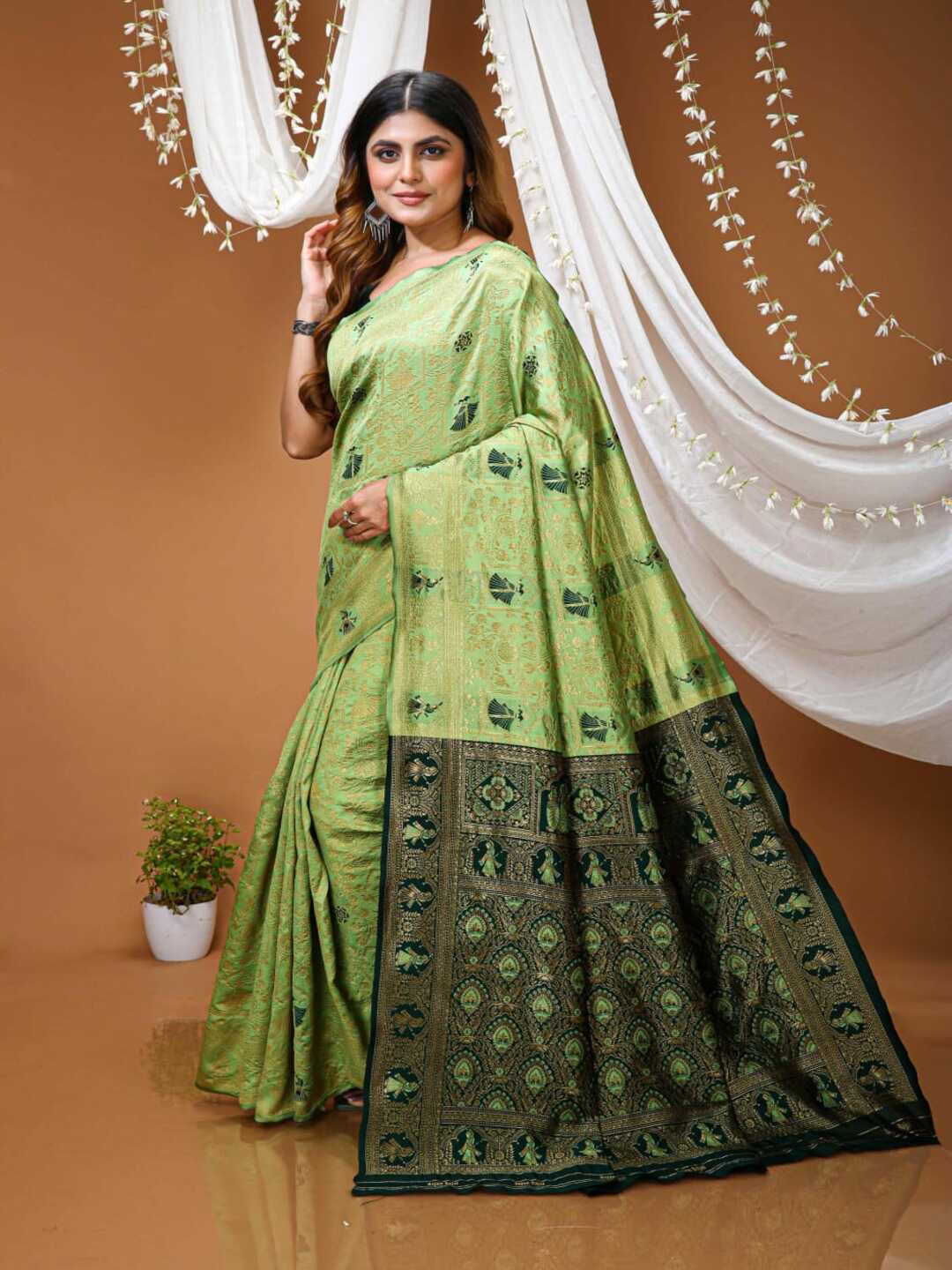 Graceful Pastel Green Banarasi Silk Saree with Rich Zari Border