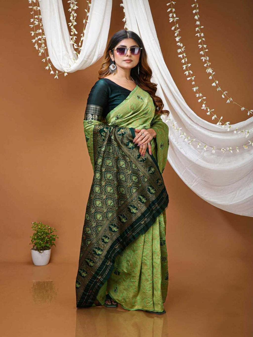Graceful Pastel Green Banarasi Silk Saree with Rich Zari Border