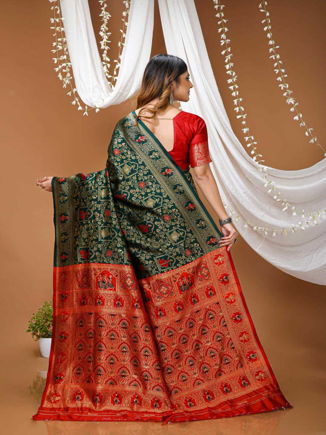 Graceful Pastel Green Banarasi Silk Saree with Rich Zari Border