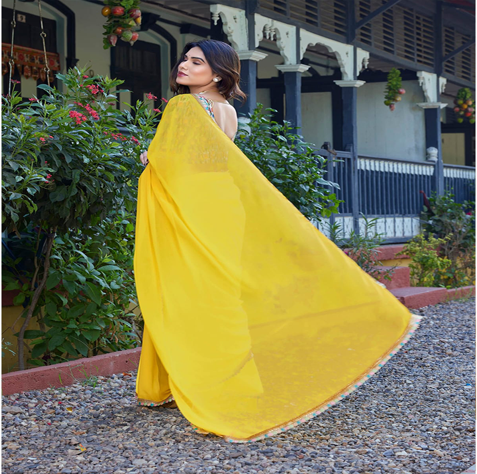 Elegant Yellow Georgette Saree with Designer Border & Printed Blouse – Festive & Party Wear