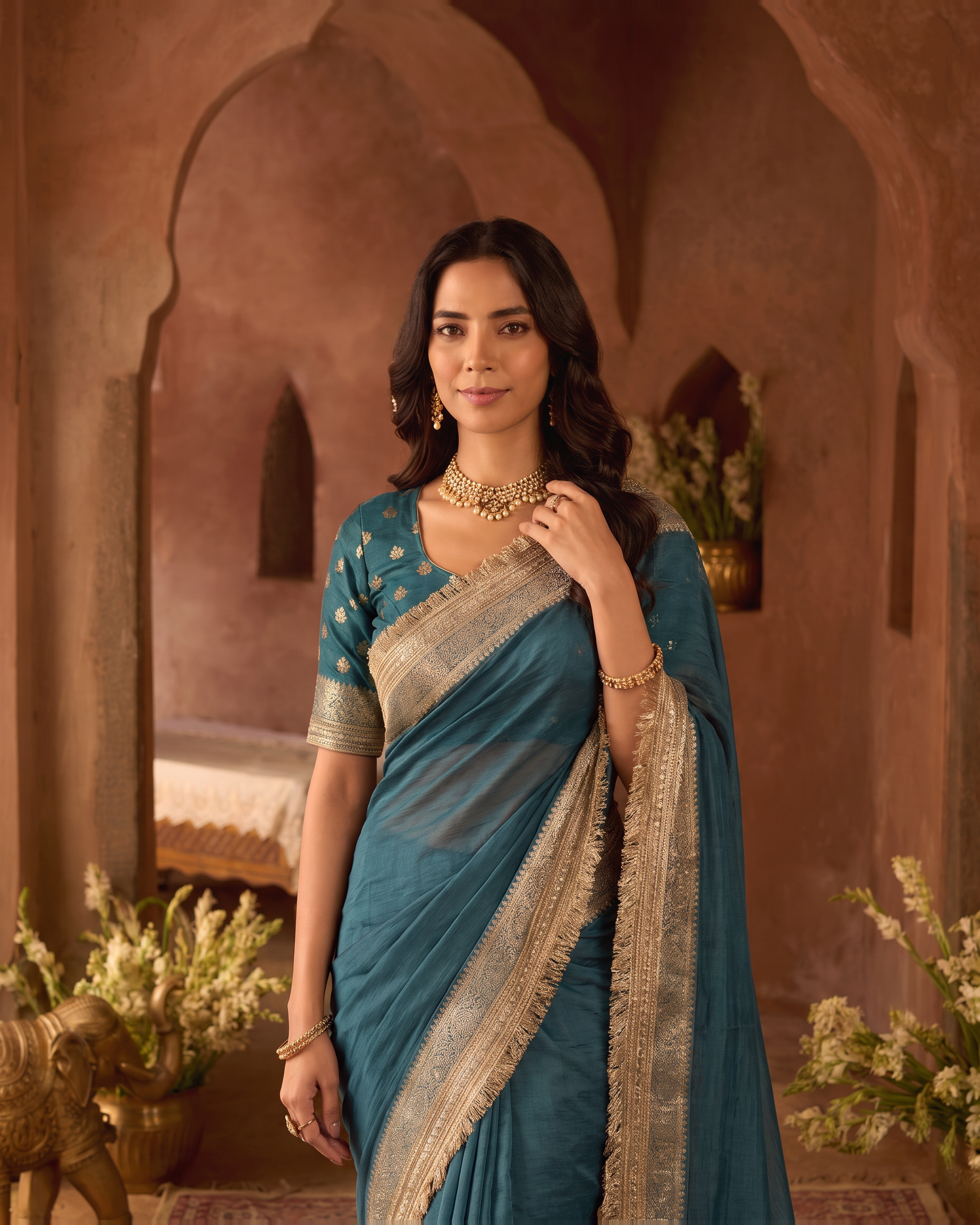 Rhea Tissue Finish Festive Saree with Luminous Pallu - Teal - upper closeup