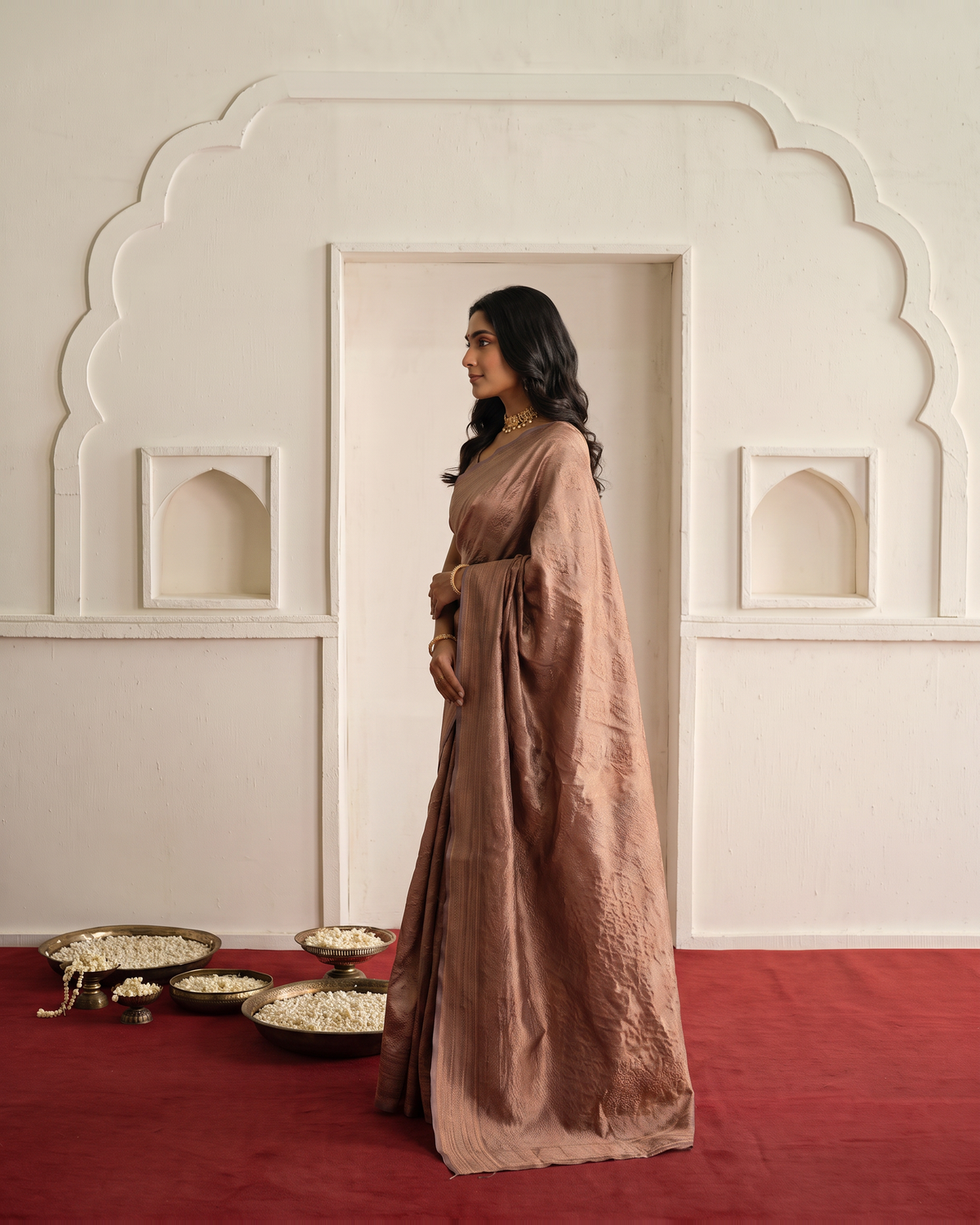 Rosy Beige Silk Saree with Satin Sheen and Classic Border - side drape